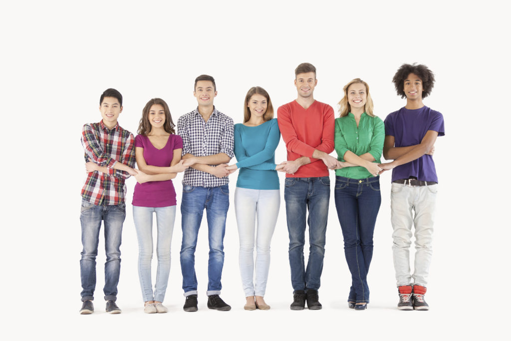 Group of 7 people standing together to show strength - Curriculum Decisions